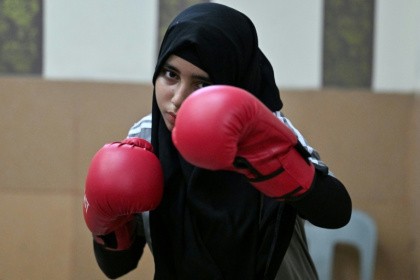 Hoorain Zahra shadow-boxing during a sparring session at a local boxing club in Karachi's Lyari town - Asif HASSAN (AFP)