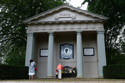 Well-wishers leave flowers at a memorial to Diana in the grounds of her ancestral home Althorp House in central England on the 29th anniversary of her death - Peter Nicholls (AFP)